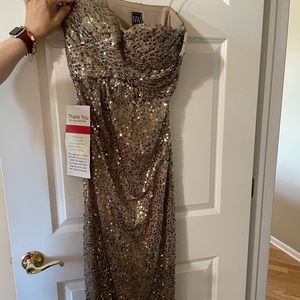 Sparkly gold dress sleeveless. Size 10 NEVER WORN